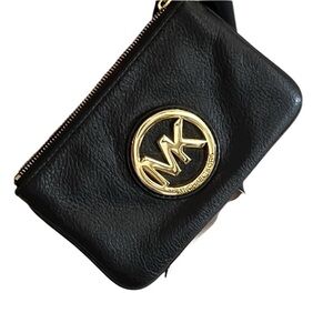 Michael Kors, black leather, wristlet, gold detail 2 inside pockets like new